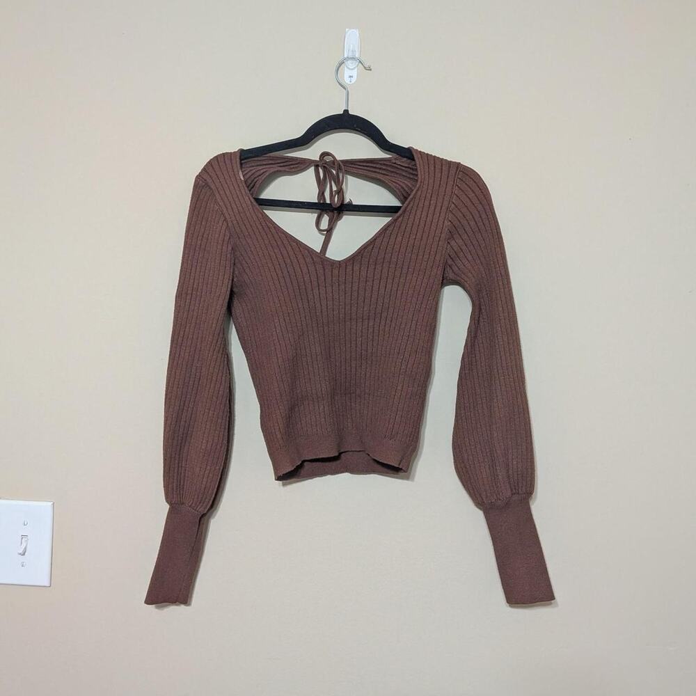 Vestique Bown Ribbed Knit Long Puff Sleeves And An Open Tie Back